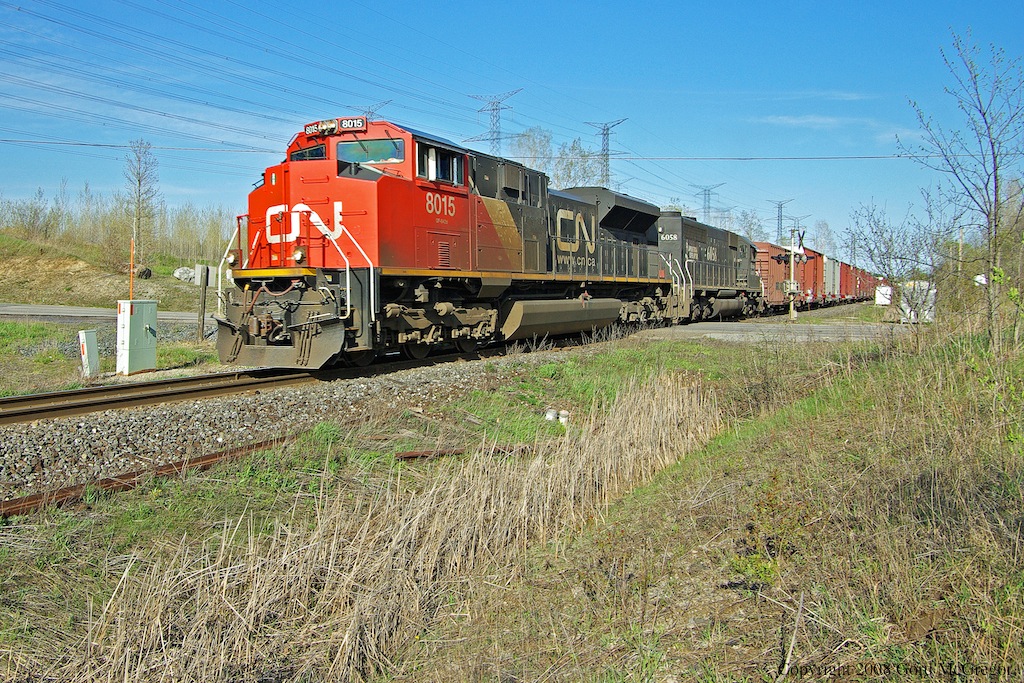 CN 8805 and IC 6058 lead manifest Westbound at Reesor Road in Scarborough Ontario.