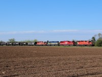 CP 6050 takes charge of CP 640 as they glide through a feild in Progreston. Trailing in the consist was SOO 6058, DME 6368, & CP 5965.