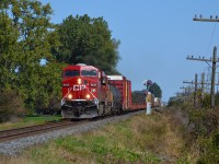 CP 245 with a Gevo and a SOO head westbound out of Ringold on a sunny fall afternoon.