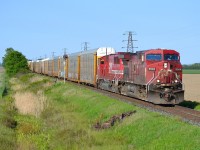 CP 147 led by CP 9504 & SOO 6061 heads westbound towards Tilbury as it passes the block signal at mp 77.4