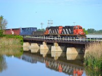 CN 438 makes its daily trip from Windsor to London and crosses the bridge at jeannettes Creek.