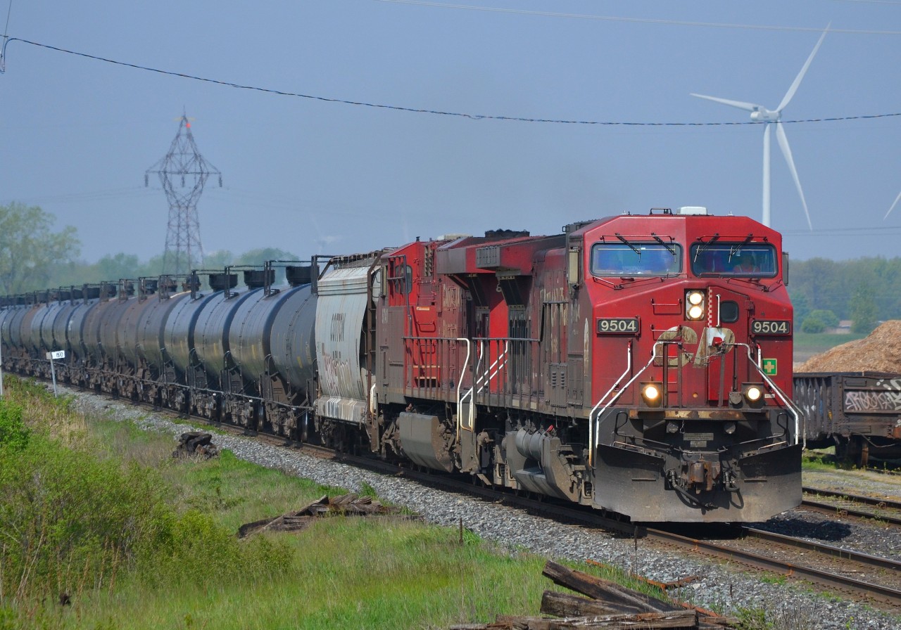 CP 608 a crude oil train, led by a pair of GEs heads eastbound thru Tilbury riding the coat tails of 244 which was about 10 minutes ahead of him.