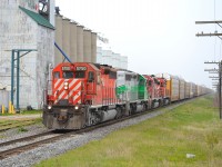 CP 147 with a nice all EMD lashup, heads westbound past the grain elevator at Arkwood. mp 58 Windsor Sub.
