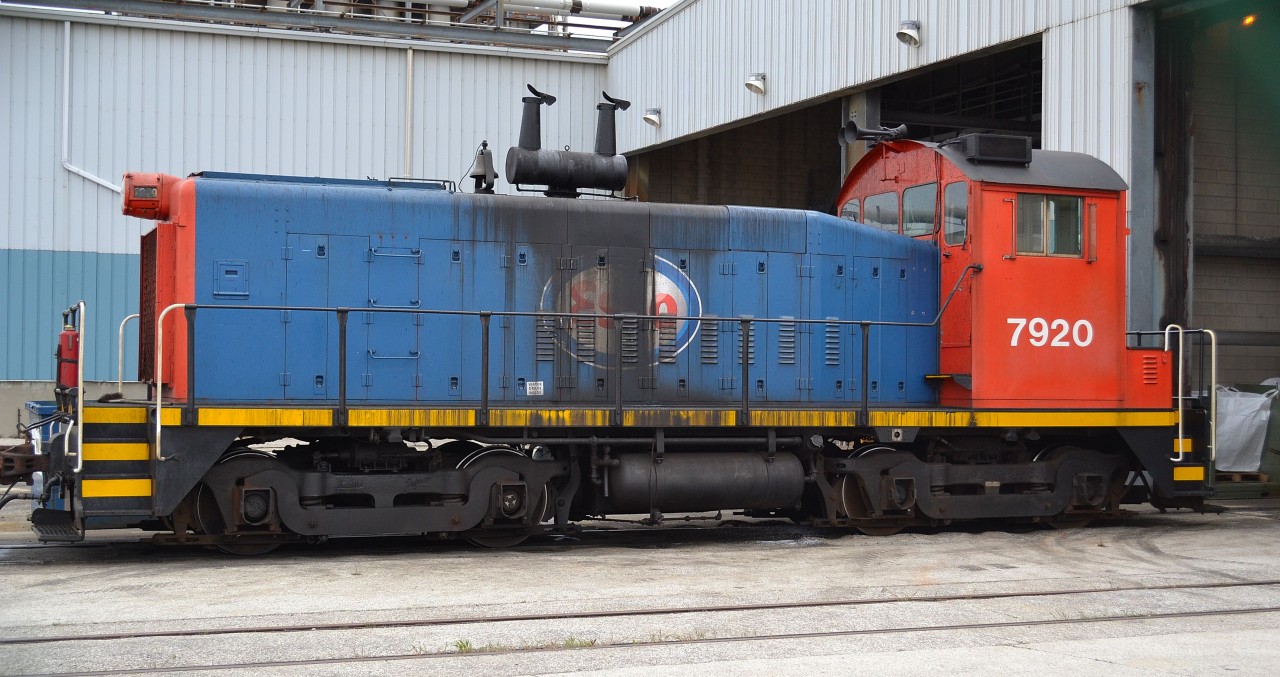 The Esso Chemicals switcher in Sarnia, an SW900, idles outside the shop waiting for its next job.