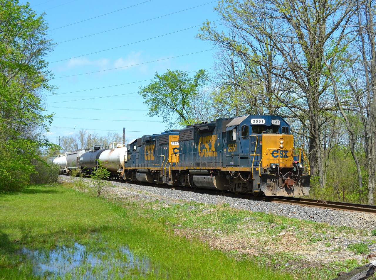 Thr Sarnia CSX local heads south on the St Clair River Industrial Spur just after doing work in the CN Sarnia Yard.