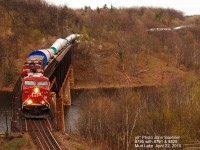 CP #785 "Darcy the Dragon" wind tower loads lead by 8791 & 8829 at Mud Lake Trestle, Feldspar, Ontario, April 22, 2010