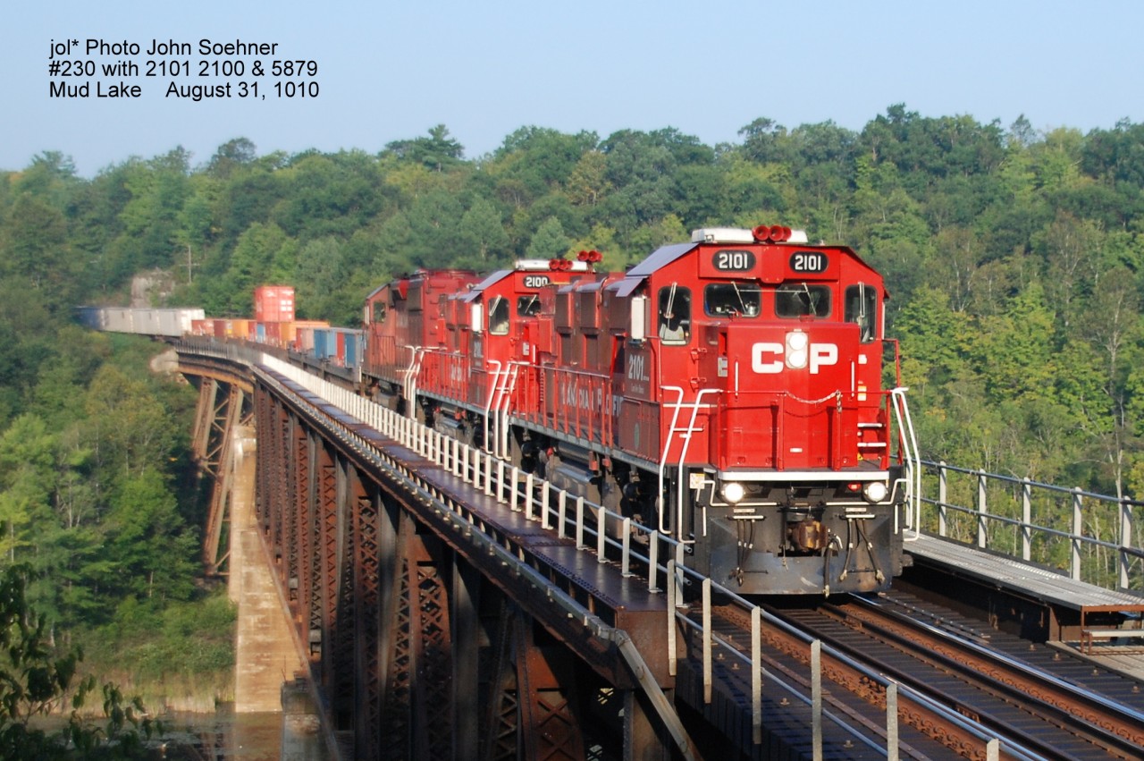 CP Gensets 2101 2100 and SD40-2 5879 with #230 at Mud Lake Trestle, Feldspar, Ontario August 31, 2010