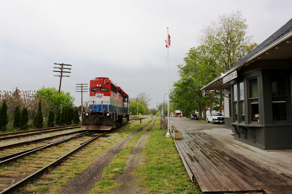RLK 4057 sits outside of the Caledonia train station.  Once travelers used to wait on this platform to board GTW and CN trains.  Now they see two trains a day from Rail America\'s Southern Ontario Railway.