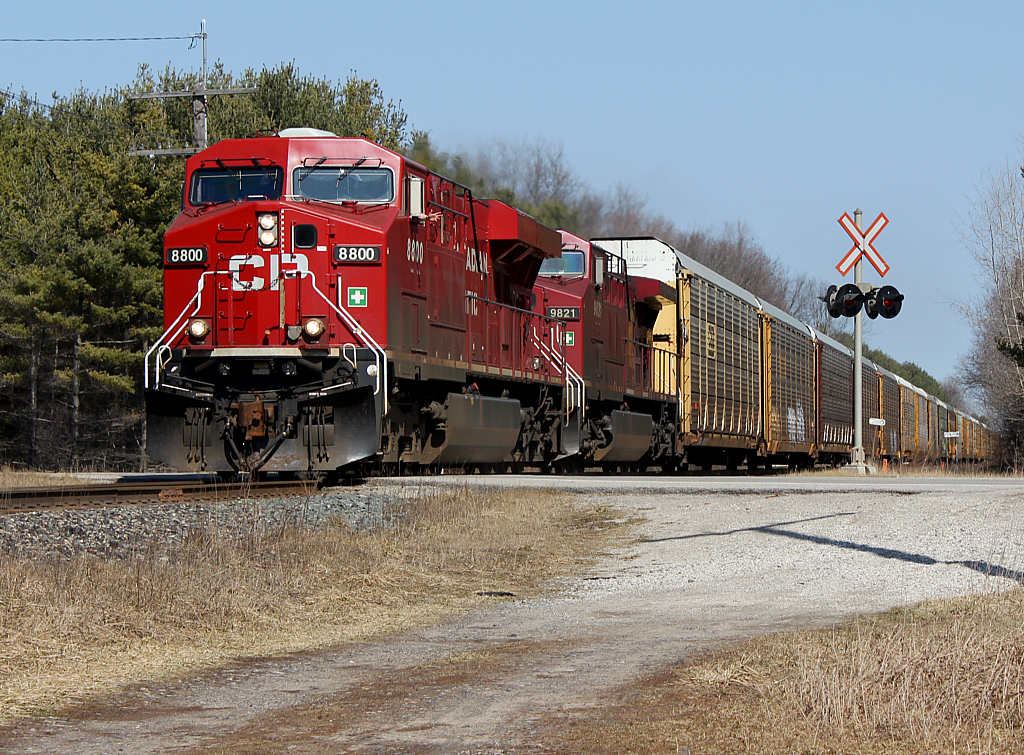 CP 147 approaches Woodstock/Coakley as the conductor gives a nice wave.