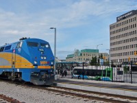 VIA 84 entrains at Guelph while buses begin using Guelph's new transit hub.