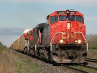 CN 382 pulling out of Sarnia, with warn out painted 2521 leading, CN 5657, and a freshly painted CN 2186