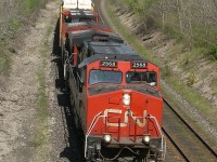 CN 2568 brings a long and heavy 393 out of London towards Sarnia.