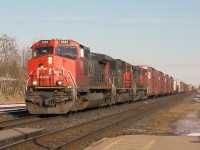 CN 2685 heads west down the CN Dundas Sub, through Woodstock, Ontario. Notice how this C44-9W has a DPU marker above the ditch light.