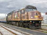 VIA 6414 Rest under cloudy skies at VIA Walkerville Station in Windsor, before heading back east on 76.