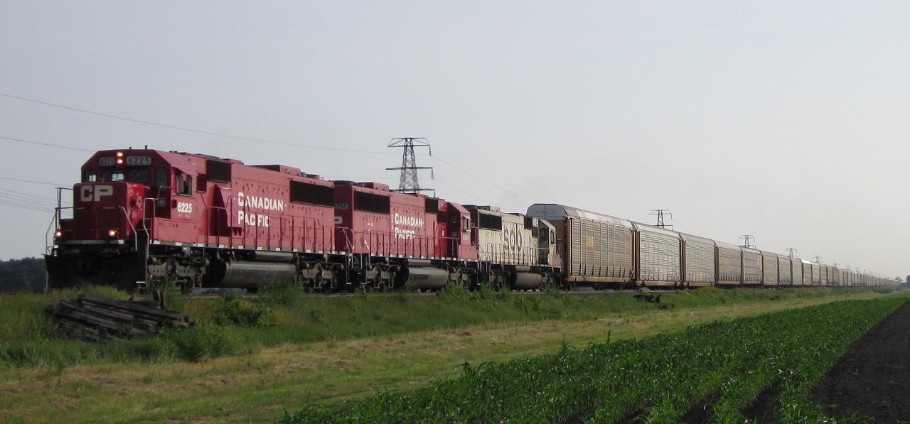 CP 242 heads east with an awesome lashup! CP 6225-CP 6254-SOO 6026