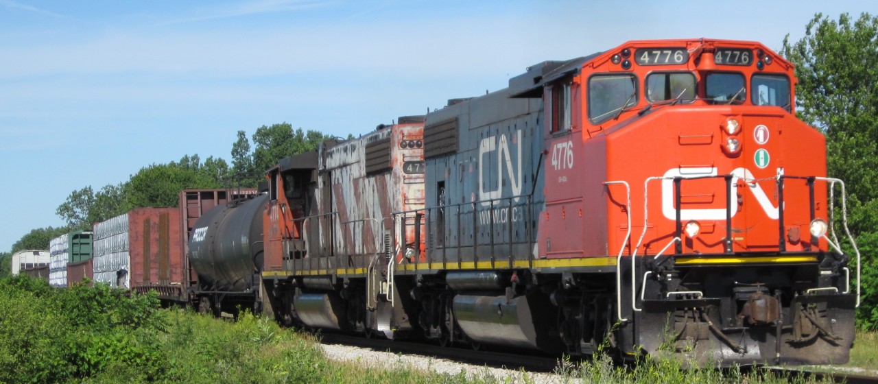 CN 439 sports some 80's power as it crosses Dillon Road heading west to Windsor.