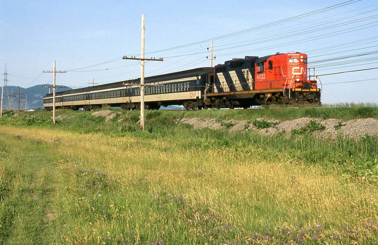 The last year of the old suburb train Montreal-St-Hilaire seen here at st-Bruno,unfortunaly the poles and wires spoil it a bit.