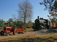While visiting the Simcoe County Museum's annual fall "Steam-up" we happened upon ex-CN 4-6-0 1531 which had recently been transplanted from a relatively barren and unattractive section of Barrie's waterfront. Unfortunately the old ten-wheeler was not one of the machines in condition to be steamed up, but there were several pieces of equipment working away that day down in the gravel pit - our favorite was an old coal-fired steam shovel that clinked and clanked as it loaded gravel into a couple of vintage dump trucks.