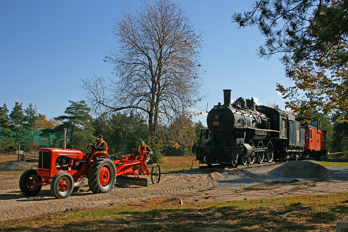 While visiting the Simcoe County Museum\'s annual fall \"Steam-up\" we happened upon ex-CN 4-6-0 1531 which had recently been transplanted from a relatively barren and unattractive section of Barrie\'s waterfront. Unfortunately the old ten-wheeler was not one of the machines in condition to be steamed up, but there were several pieces of equipment working away that day down in the gravel pit - our favorite was an old coal-fired steam shovel that clinked and clanked as it loaded gravel into a couple of vintage dump trucks.