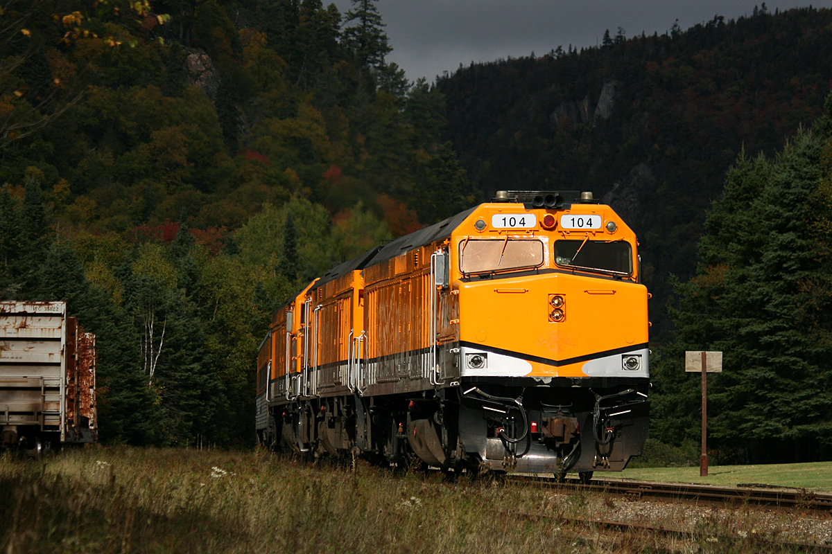 Agawa Canyon day-trippers all back on board, CN 633 departs Canyon just as a hole opens up in the black clouds. CN 104 leads the consist, all still in DRGY Ski Train bumblebee paint. Post-processing consisted solely of resizing and sharpening, other than that this image is straight from the camera.