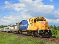 ON 1809 dodges scattered thunderstorms as it heads for Toronto on a typical June day in Muskoka.
