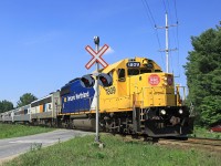 ONR 698 slices across Old Muskoka Road while "Shadow the Railfanning Dane" watches from the back seat of my car across the way. 