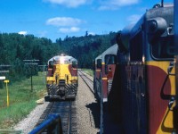 I was making a tour of the line and here No. 1 is taking the siding for No. 2. I had just started working for the ACR so I had to see what the road looked like...even though it was on my own time it was a good trip.