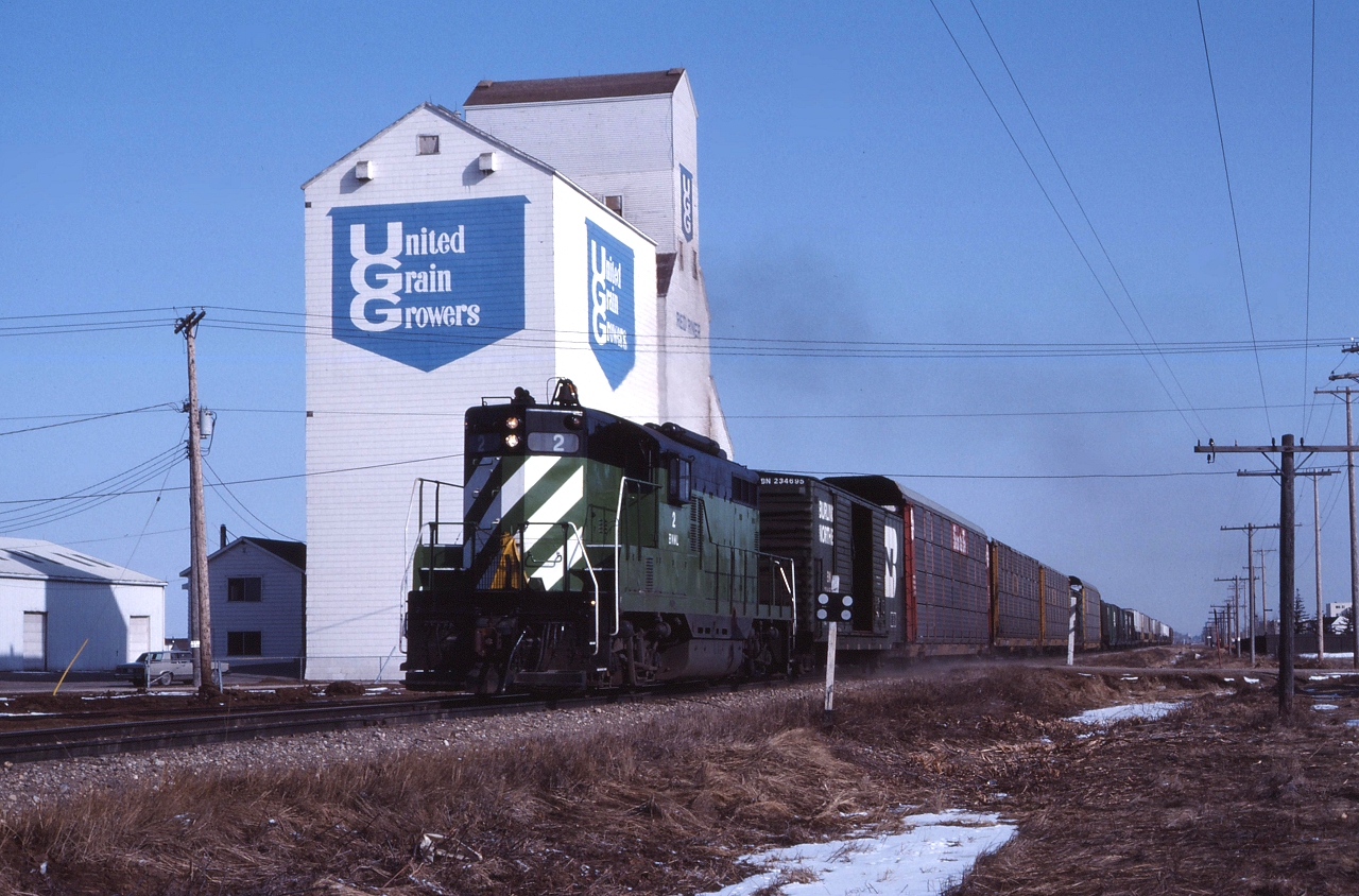 Burlington Northern Manitoba Lines #2 rolls through Red River.