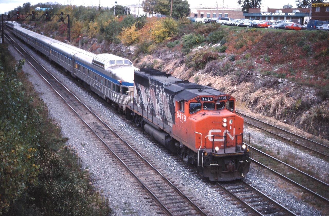 VIA #15, the Ocean is being pulled to Central Station by CN 9479 after detouring over the CP from Delson due to a work block on the Victoria Bridge.