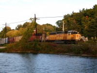 CP 5431 still in UP colours grinds uphill at dusk.