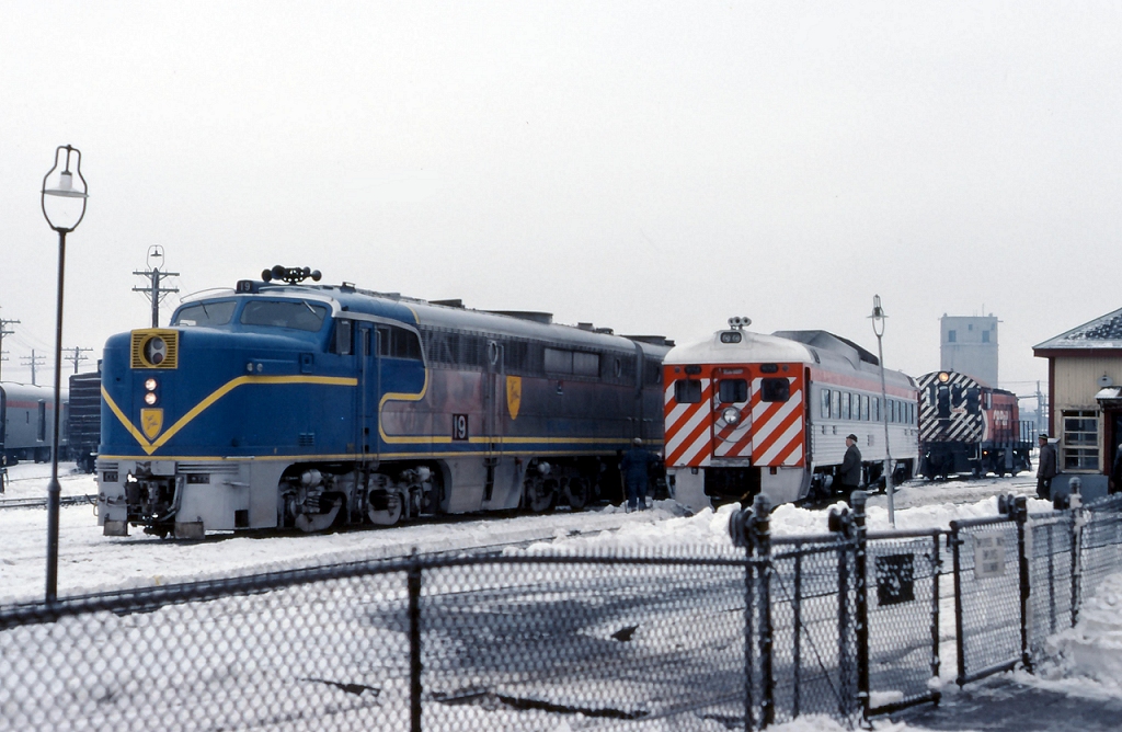 The action at Westmount includes a CP RDC, D&H PA's and an MLW switcher on a cold December day.