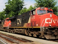 CN-2272 ES-44-DC follow of CN-8013 SD-70 M2 and CN-2503 C-44-9WL pulling a convoy of containers nearly 11,000 feets on rte 120 to Halifax N.Scotia