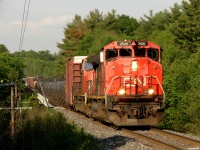 CN A45031 10 - CN 2520 South on the approach to Gravenhurst at speed, 2520/5621 will have no problem slowing their short but heavy 55 car train from North Bay down for the slower speed through town just ahed.