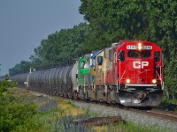 CP 640 heads eastbound out of Tilbury led by rebuilt CP 6240 and a colorful all EMD lashup