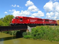 CP 6255 on it's maiden voyage after being rebuilt at CAD in Montreal, along with 6225 leads CP 141 westbound towards Tilbury on its way towards Windsor.