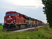 CP 242 heads eastbound out of Tilbury with a 6 engine lashup consisting of CP 8857-ICE 6424-CITX 2785-CP 9678-CP 9541-CP 9601. The tail end of this train also had 3 VIA stainless coaches