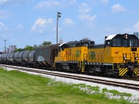 ETR 104 & 108 haul a pretty long train beside the Windsor CP Yard with the Detroit skyline in the background.