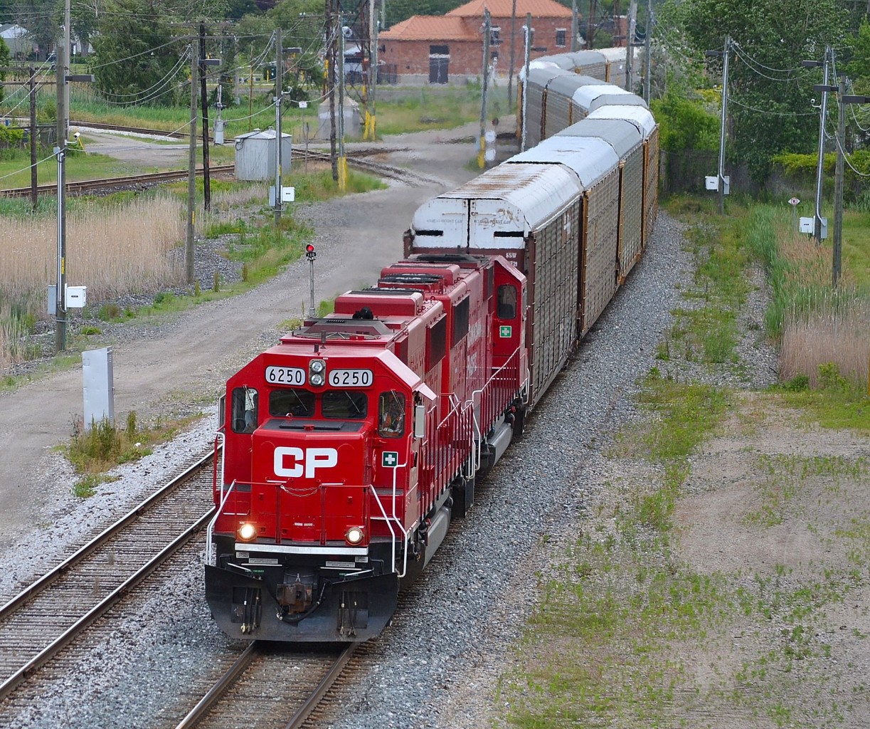 CP 245 led by rebuilt CPs (ex SOOs) 6250 and 6225 head west towards the Detroit-Windsor tunnel as they approach the Ouellette Ave overpass.