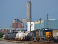 The CSX to CN Daily transfer starts off its day shunting cars after just pulling out of its shops.