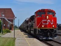 CN 393 led by 8808 rolls by the Sarnia VIA station on its way toward the tunnel to Port Huron