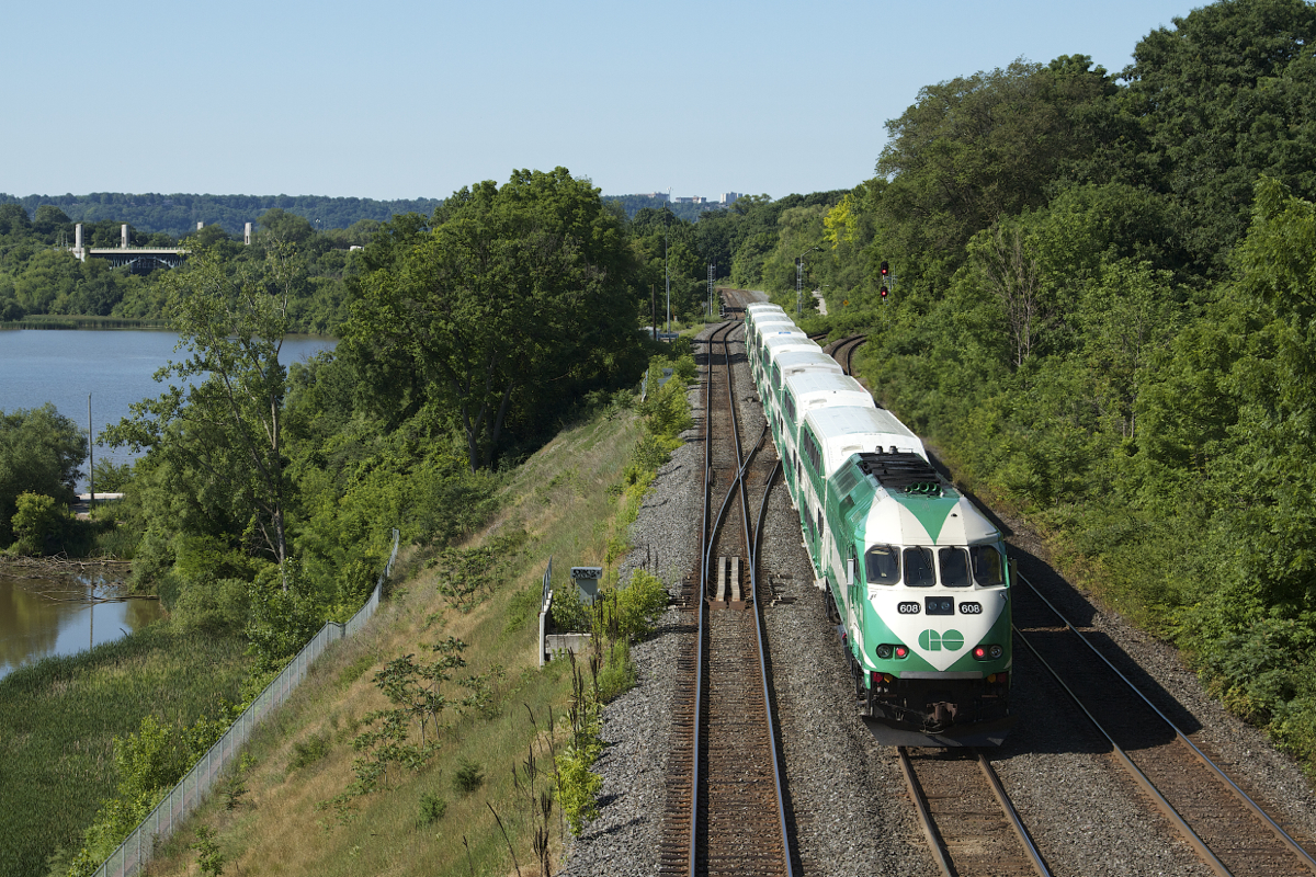 On June 23rd 2012 close to 40 railfans young and old met up at Bayview Junction for the annual 'FoamFest'. With a shortage of eastbound traffic on CN most of the railfans were occupied by the morning passenger train rush. In this photo GO 608 is seen shoving an 8 car train (781) towards the Grimsby Subdivision with passenger traffic bound for Niagara Falls.