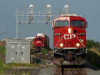 CP 245 highballs through Wolverton as the Pender Jobs waits to finish their work. 