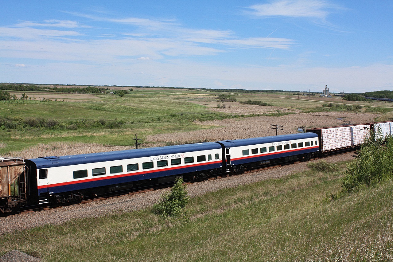 CN 312 has a little surprise for me as it has two rocky mountaineer coaches bound for the east to get a repaint.