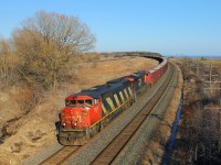 In response to Eric's posting of O493, here's my shot, albeit a tad wider, of CN's O49321 08 bound for London Jct passing Lovekin with a draper taped SD60F and a GEVO. If SD60F's are what you desire, I suggest heading west to Alberta.