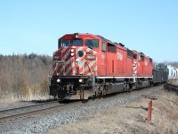 A matched pair of CP SD40-2F "Red Barns" lead a westbound freight near Puslinch siding.