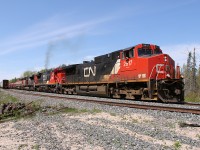 CN M314 departs Gamsby after a bit of a delay due to the RTCC in Toronto being evacuated. Train X301 is in the siding, and we (lift gang) are stuck in the back track.