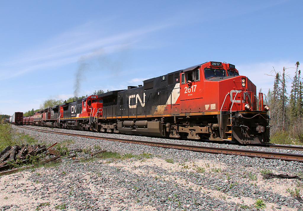 CN M314 departs Gamsby after a bit of a delay due to the RTCC in Toronto being evacuated. Train X301 is in the siding, and we (lift gang) are stuck in the back track.