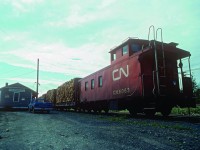 The Lewisporte switcher is making up its train of pulpwood at Glenwood. The loading area was just west of the depot on a spur. After the train is complete, it will depart for Bishop's Falls.