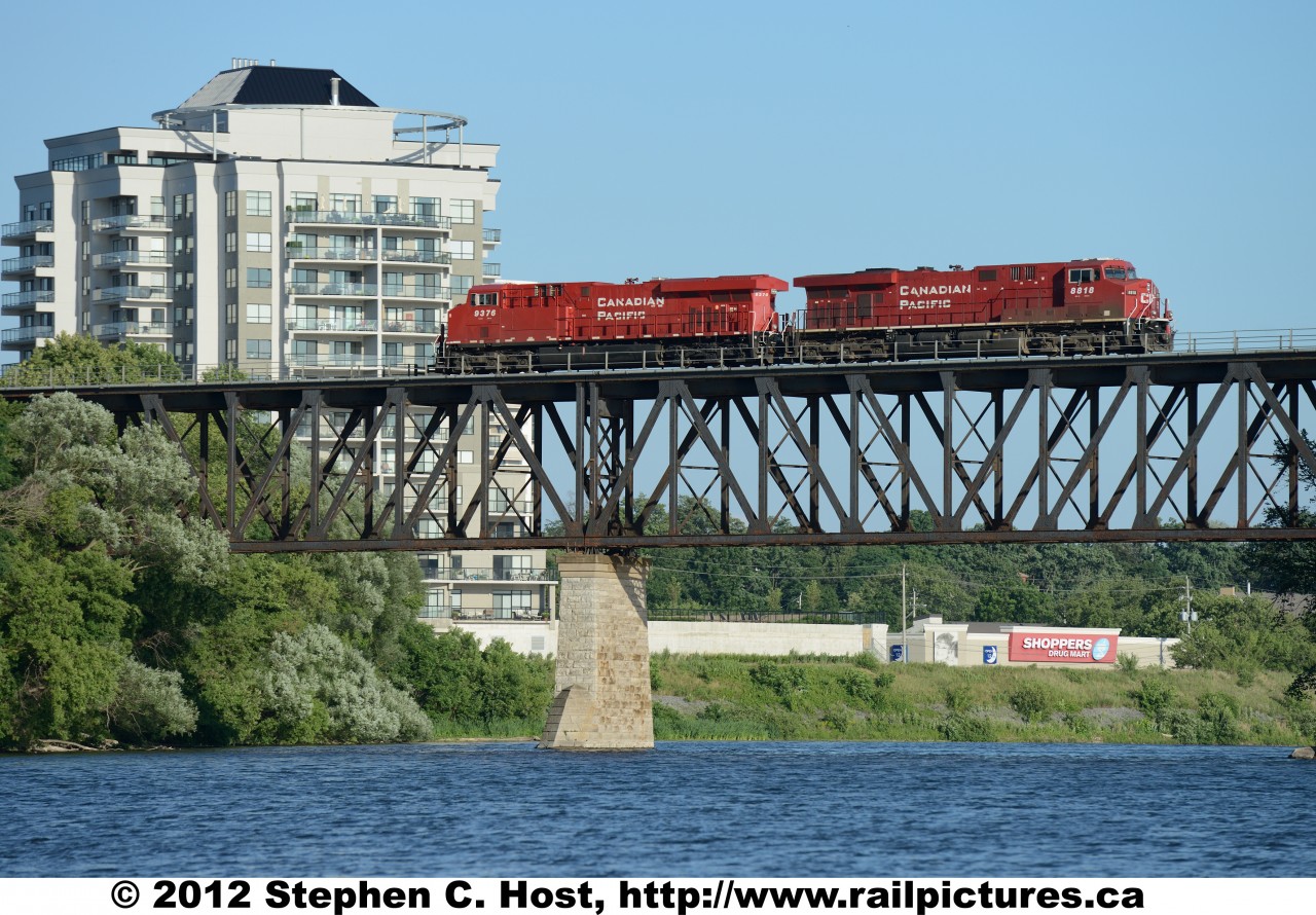 CP 9376 east with CP 8818 is a light power move passing over the Grand River at Galt (Cambridge) after setting off their autoracks at Wolverton Yard.