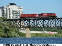 CP 9376 east with CP 8818 is a light power move passing over the Grand River at Galt (Cambridge) after setting off their autoracks at Wolverton Yard.